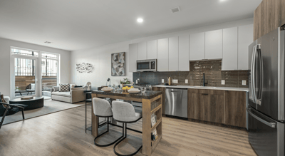 Modern kitchen and living area in a senior facility.