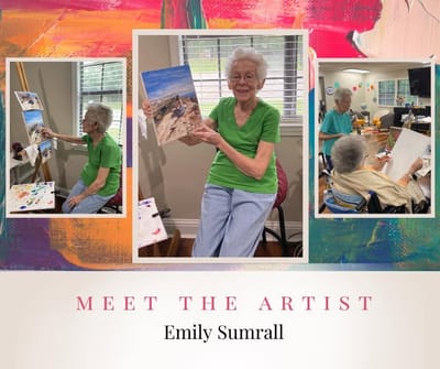 Resident painting during an art class activity.