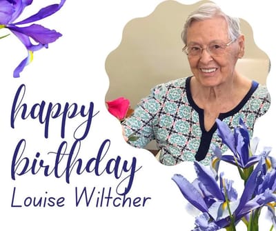 Resident celebrating a birthday with flowers