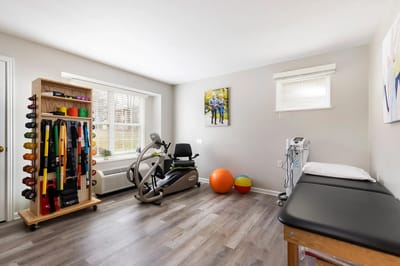 Fitness area with exercise equipment and weights