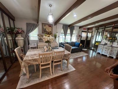 Common area with a dining table and seating.