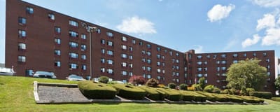 Exterior view of Borden Place with landscaped grounds