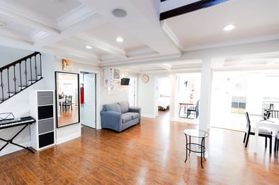 Bright common area with seating and decor