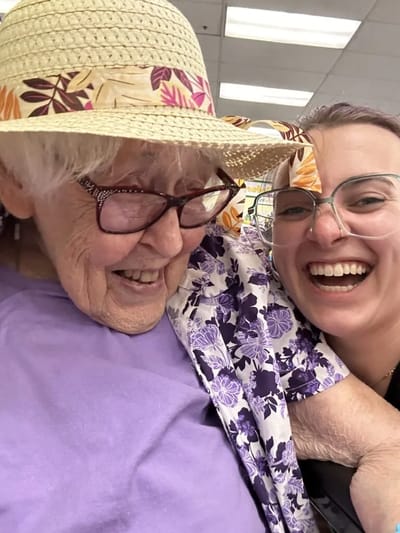 Resident and staff member enjoying a moment together