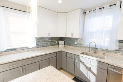Bright kitchen area with modern cabinets and countertops
