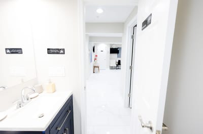 Interior view of a resident bathroom with polished fixtures