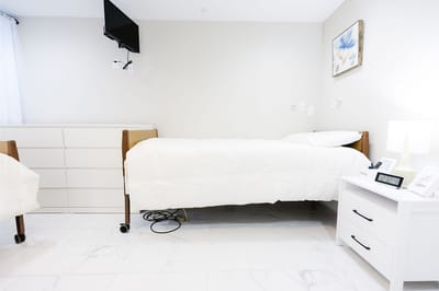 Minimalist private resident room with two beds