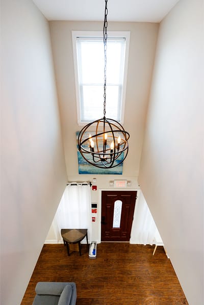 Interior view of a hallway with light fixture