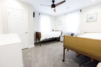 Bright, spacious resident room with bedside tables