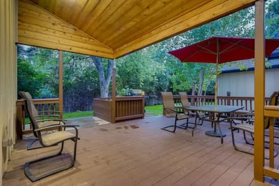 Outdoor patio area with seating and shade