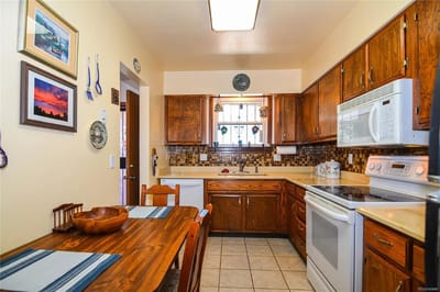 Cozy kitchen interior with wooden furniture
