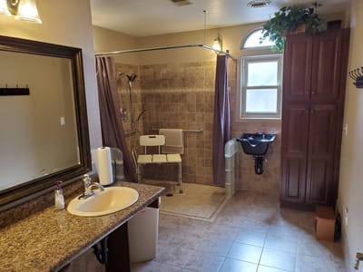 Accessible bathroom with safety features and modern decor