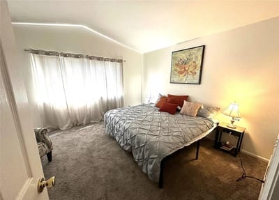 Cozy private room with a bed and decor