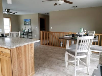 Bright, open common area with dining setup
