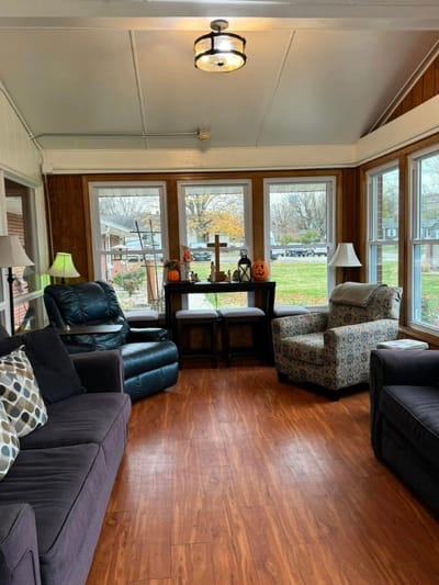 Cozy common area with seating and fall decorations