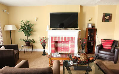 Cozy lounge area with comfortable seating and decor