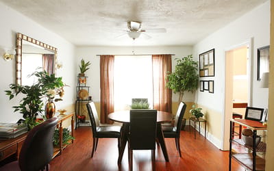 Cozy dining area with a round table and seating