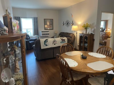Cozy common area with seating and a dining table