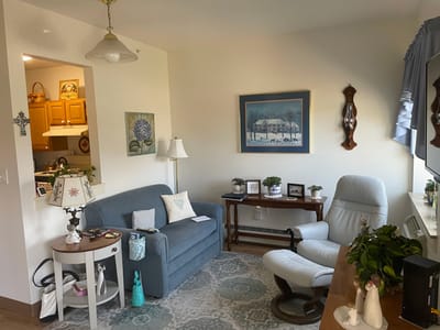 Cozy interior of a resident's room with seating