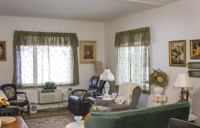 Cozy common area with seating and windows
