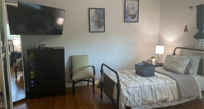 Interior view of a resident room with furniture