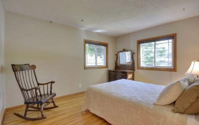 Cozy private resident room with a wooden rocking chair