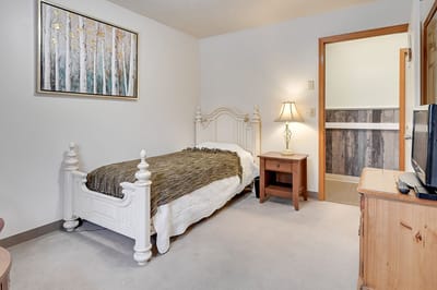 Private resident room with a single bed and decor