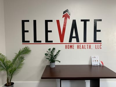 Facility logo on a wall in the lobby
