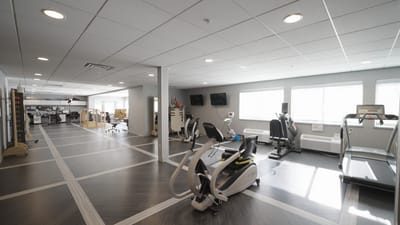 Interior view of a fitness room with exercise equipment