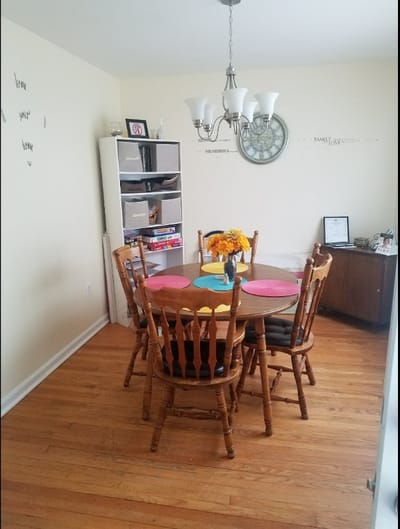 Dining room with wooden table and chairs