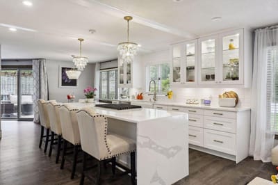 Modern kitchen interior with white cabinetry and island