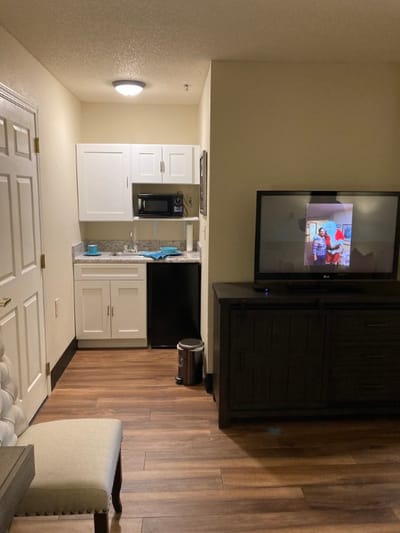 Interior view of a resident room with kitchenette