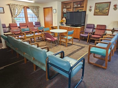 Cozy common area with seating and a television