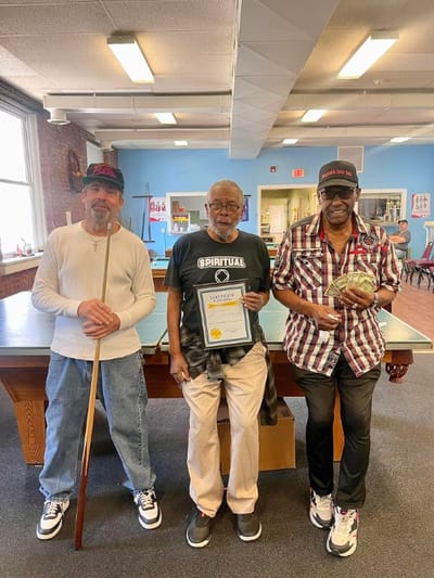 Residents celebrating in a vibrant common area