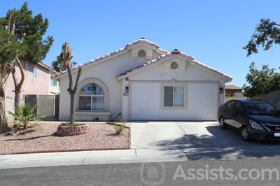 Embry Ridge Senior Care, assisted living in Las Vegas, NV — Single-story house with a landscaped front yard