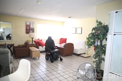 Bright common area with seating and accessible features