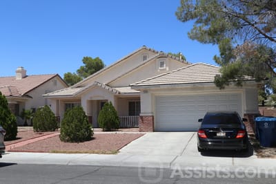 Health Life, assisted living in Las Vegas, NV — Single-family home with a garage and landscaped yard