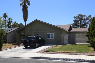 Exterior view of a single-story house with driveway