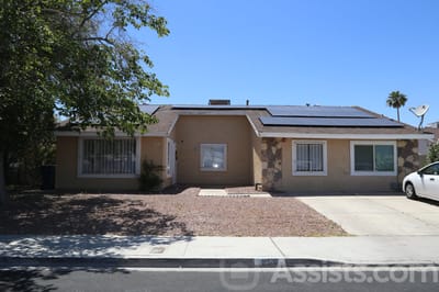 Exterior view of the residential facility with solar panels
