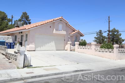 Carmela Homes, assisted living in Las Vegas, NV — Single-story residential home with a paved driveway