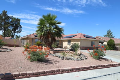 Exterior view of a senior care facility with landscaping