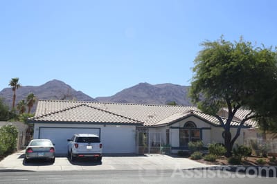 Exterior view of a single-story assisted living facility