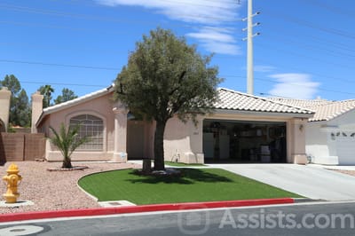 Happy Adult Care, assisted living in Las Vegas, NV — Single-story house with a landscaped front yard