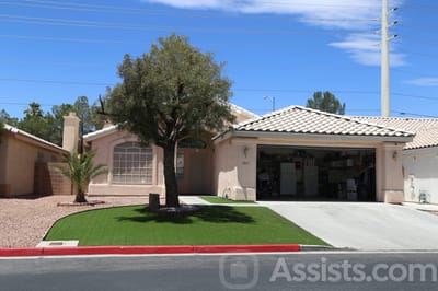 Happy Adult Care, assisted living in Las Vegas, NV — Single-story house with landscaped front yard and driveway