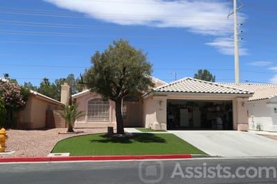 Happy Adult Care, assisted living in Las Vegas, NV — Single-story house with a well-manicured lawn