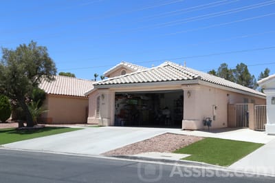 Happy Adult Care, assisted living in Las Vegas, NV — Single-story residential building with a garage and driveway