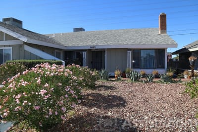 Theresiane Adult Group Care, assisted living in Las Vegas, NV — Front exterior of a senior living facility with landscaping