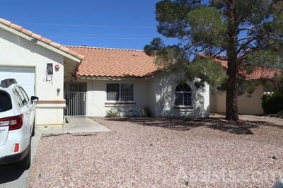We Care Residential Home, assisted living in Las Vegas, NV — Single-story residential home with landscaping and parking area