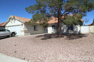 We Care Residential Home, assisted living in Las Vegas, NV — Single-story residential building with a large tree