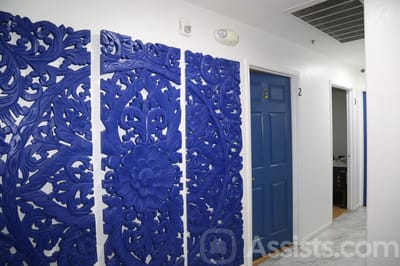 We Care Residential Home, assisted living in Las Vegas, NV — Decorative blue wall panels in a hallway